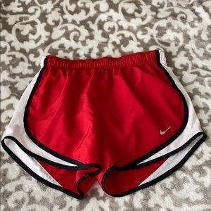 red nike shorts